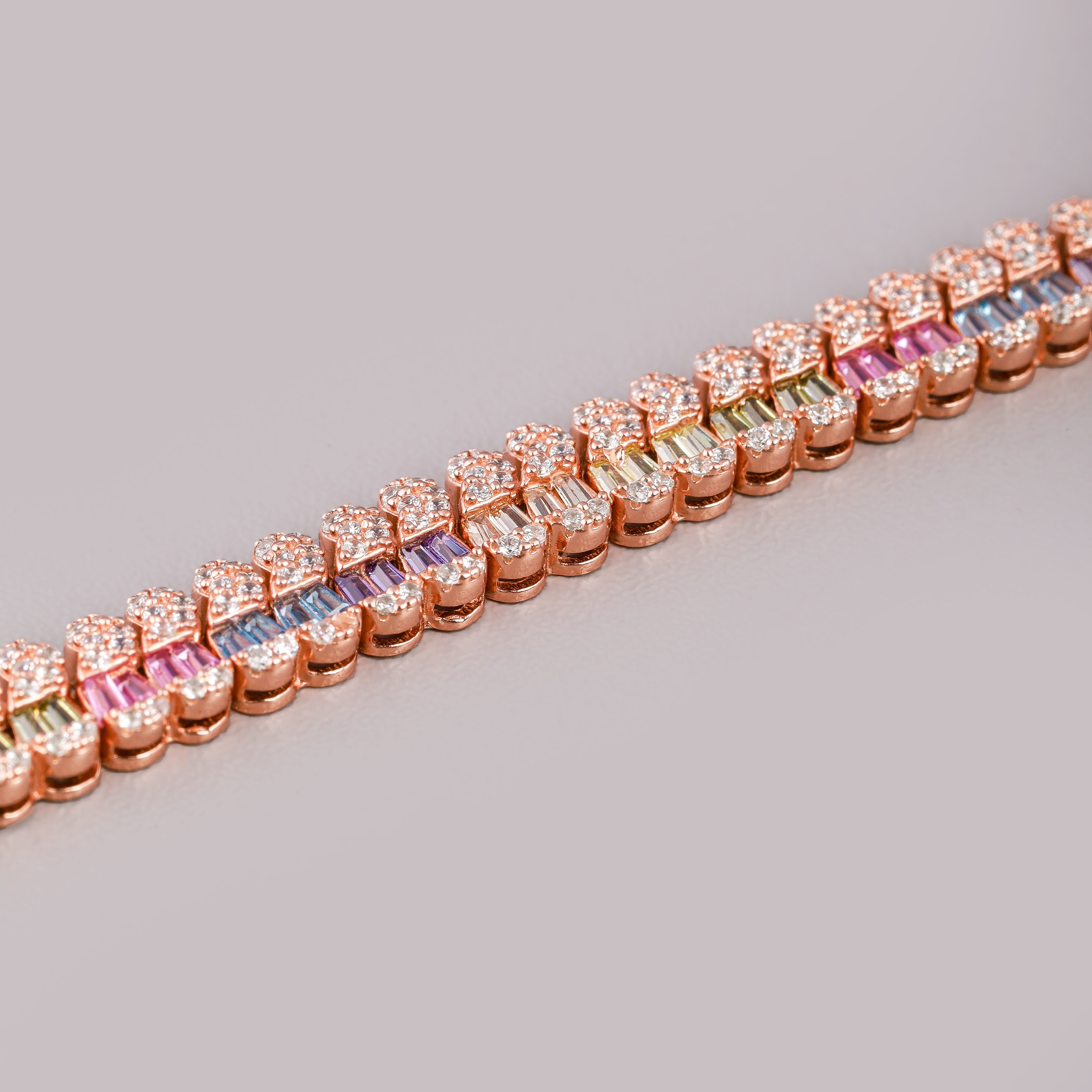 Pink sapphire tennis bracelet gold