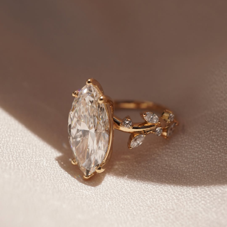 Nature Inspired Marquise Moissanite Ring With Leaf Accent - view 2