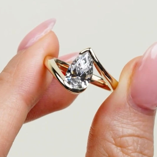 Antique Style Pear Cut Moissanite Bypass Solitaire Ring - view 2