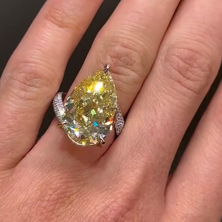 Fancy Vivid Yellow Pear Cut Moissanite Engagement Ring