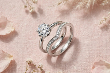Curved wedding band hugging an engagement ring