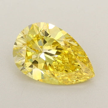 Stunning 0.72 CT Pear Shape Fancy Vivid Yellow  Color VVS1 Clarity Lab Grown Diamond For The Still