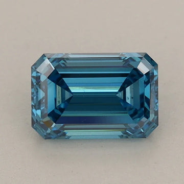 Bold Beauty Of 0.90 CT Emerald Shape Fancy Vivid Blue Color VS2 Clarity Moissanite Diamond For Soft Wind