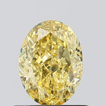 Designer Of 0.93 CT Oval Shape Fancy Vivid Yellow Color VS2 Clarity Lab Grown Diamond For Soft Touch