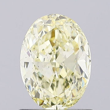 Perfect Of 0.97 CT Oval Shape Fancy Yellow Color VS2 Clarity Lab Grown Diamond For Warm Echo