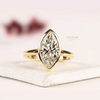 Bezel Set Marquise Cut Lab Grown Split Shank Engagement Ring