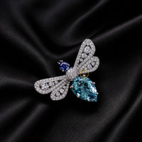 Sparkling Dragonfly Brooch with Aqua Blue Teardrop Gemstone