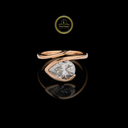 Pear Cut Moissanite Bypass Solitaire Ring