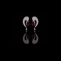 4.02 TCW Luxury Moissanite Earrings Featuring Deep Red Pear Center Stone with Baguette and Round Diamond Accents
