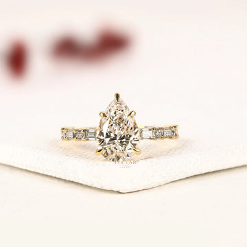 Pear Cut Lab Grown Diamond Engagement Ring with Baguette Accent Band