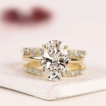Oval Cut with Two Infinity Bands Moissanite Bridal Ring Set