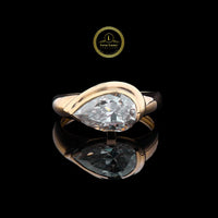 Pear Cut Bezel 3 CT Moissanite Diamond Ring in Rose Gold By Ivevar