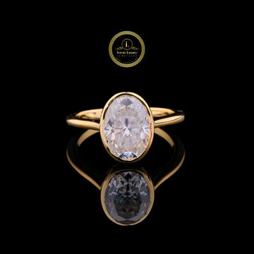 Dainty 2.00 CT Oval Moissanite Diamond Gold Bezel Set Ring By Ivevar