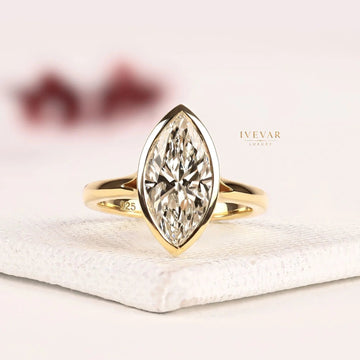 Bezel Set Marquise Cut Moissanite Split Shank Engagement Ring