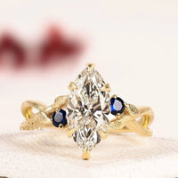 Marquise Cut Lab Grown Diamond And Blue Sapphire Engagement Ring