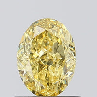Designer Of 0.93 CT Oval Shape Fancy Vivid Yellow Color VS2 Clarity Moissanite Diamond For Soft Touch