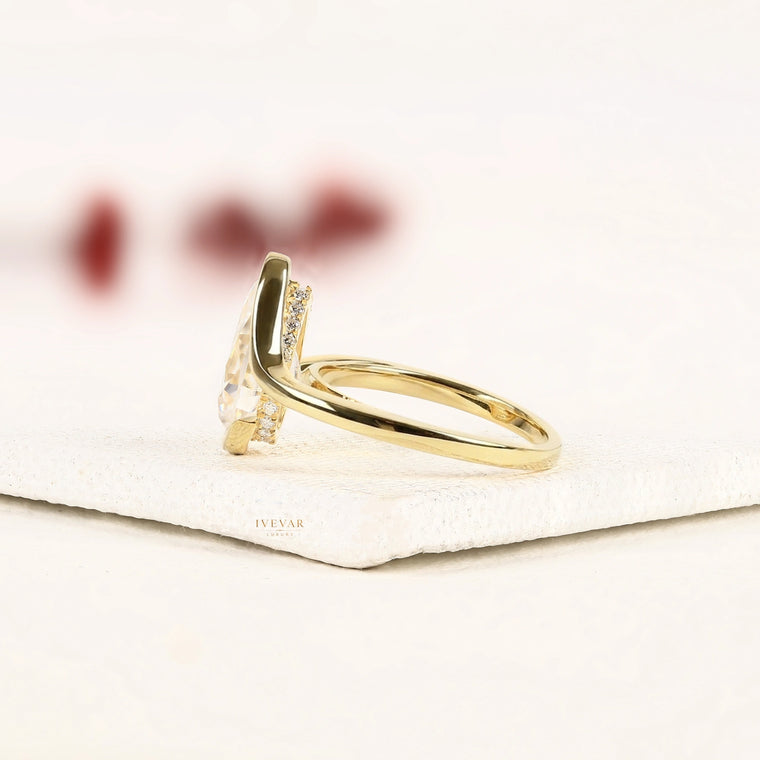 Pear Cut Moissanite Bypass Ring in Half Bezel Setting - view 2