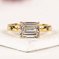 Emerald Cut Lab Grown Diamond Engagement Ring with Celestial Star Engraved Band Elegance