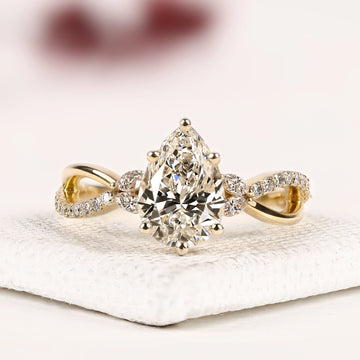 Pear Cut Lab Grown Diamond Infinity Twist Engagement Ring
