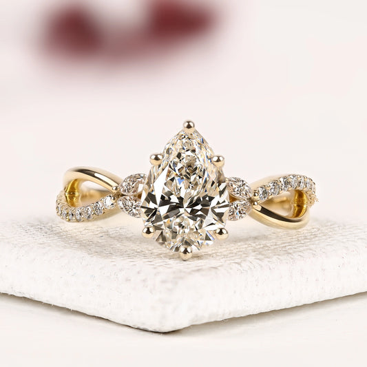 Pear Cut Lab Grown Diamond Infinity Twist Engagement Ring