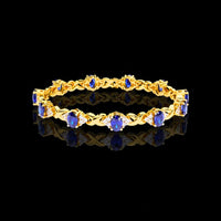 15.84 CT Exquisite Moissanite Bracelet Featuring Fancy Vivid Blue Oval and Diamond Accents Design By Ivevar