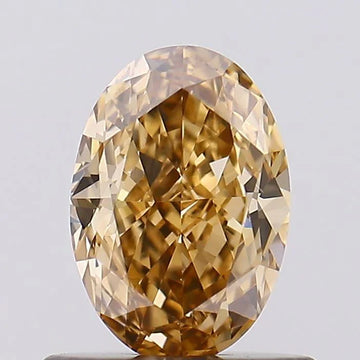 Minimalist Of 0.71 CT Oval Shape Fancy Brown Color VS1 Clarity Moissanite Diamond For Gold Light