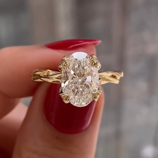 3.00 TCW Exquisite Oval Cut Moissanite Diamond Ring with Organic Leaf Prongs and Flowing Gold Band
