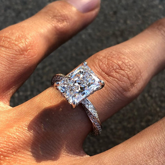 5.00 CT Elongated Radiant Moissanite Diamond Ring with Micro Pave Gold Band and Elevated Four-Prong Setting