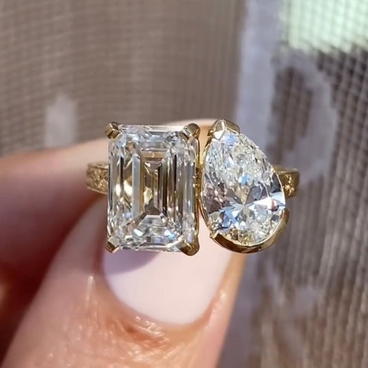 2.5 CT Toi et Moi Moissanite Diamond Ring with Emerald Cut & Pear Shape Stones in Textured Gold Setting