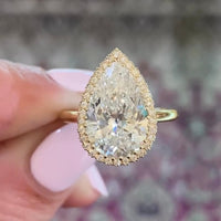 4.00 CT Elegant Moissanite Pear Cut Diamond with Delicate Micro Halo Ring