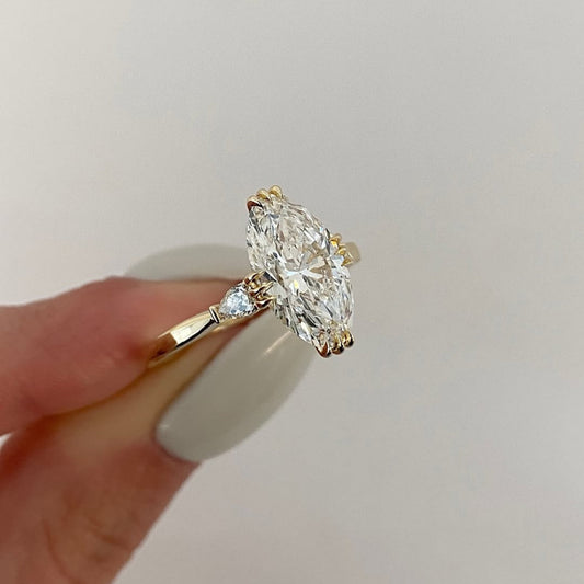 Oval Cut Claw Prong Solitaire Ring with Side Accents - view 2