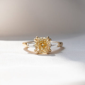 2.50 CT Sovereign Cushion Cut Moissanite Diamond Three Stone Ring with Tapered Baguette Accents in Gold
