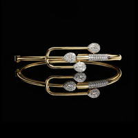 1.20 TCW Luxurious Moissanite Open Bracelet with Pear Cut Diamond Accents and Pave Detailing By Ivevar