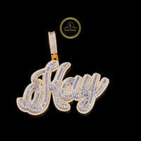 Custom Kay Script Moissanite Diamond Pendant With Baguette Accents In Two Tone Gold By Ivevar