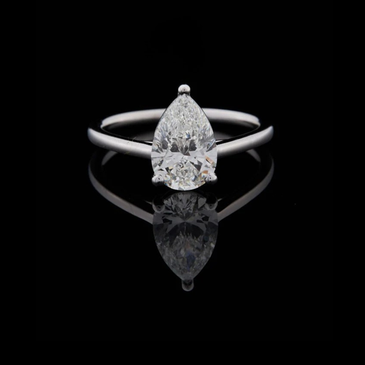 1.00 TCW Exclusive Pear Moissanite Diamond Ring Featuring a Brilliant Center Stone and Modern Slim Band