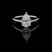 1.50 TCW Exclusive Pear Moissanite Diamond Ring Featuring a Brilliant Center Stone and Modern Slim Band