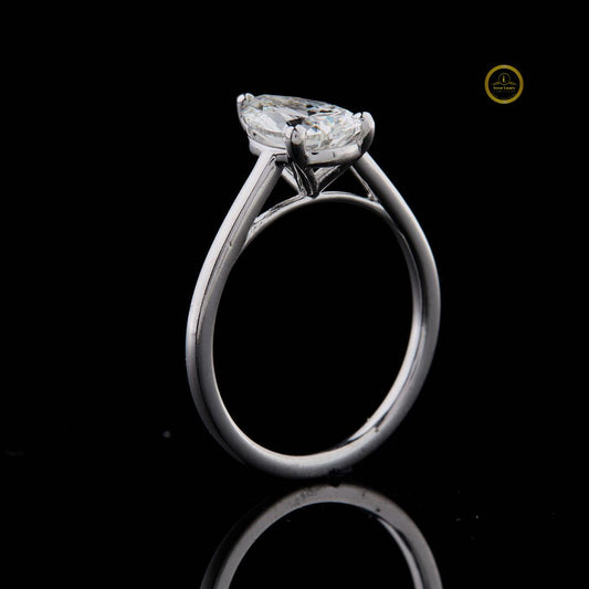 Pear Cut Solitaire Moissanite Engagement Ring With Cathedral Basket - view 2