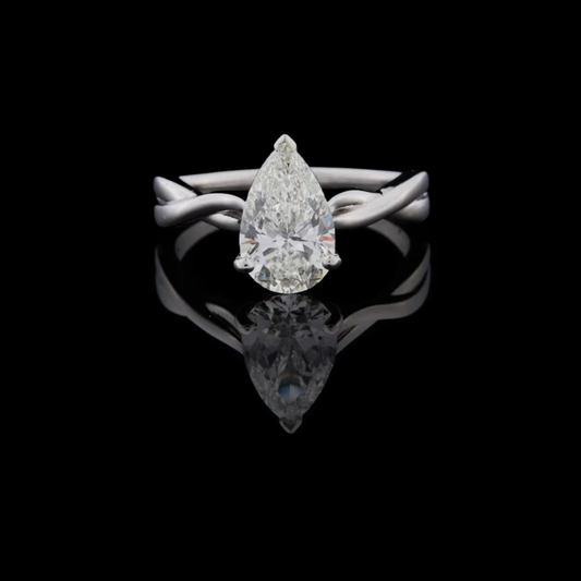 1.50 TCW Elegant Pear Shaped Moissanite Diamond Solitaire Ring with Contemporary Twisted Band Design in Polished White Gold