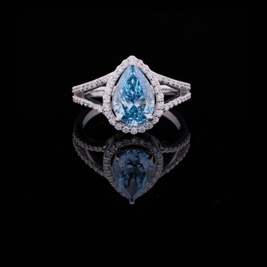 2.00 CT Gorgeous Fancy Vivid Blue Moissanite Pear Cut Ring with Halo Diamond Accents and Elegant Split Shank Band