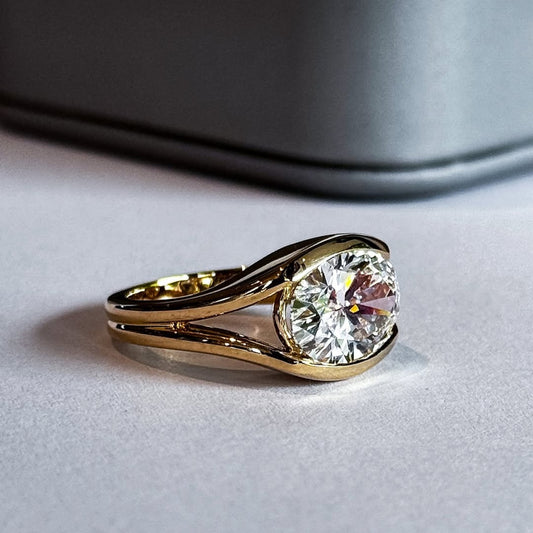 2.5 TCW Modern Moissanite Oval Cut Bezel Set East West Statement Ring