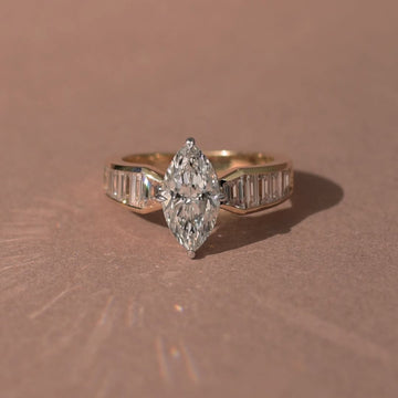3.00 CT Starlane Marquise Moissanite Diamond Ring with Channel Set Baguette Accents in Refined Gold