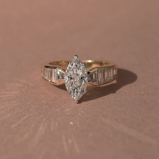 3.00 CT Starlane Marquise Moissanite Diamond Ring with Channel Set Baguette Accents in Refined Gold
