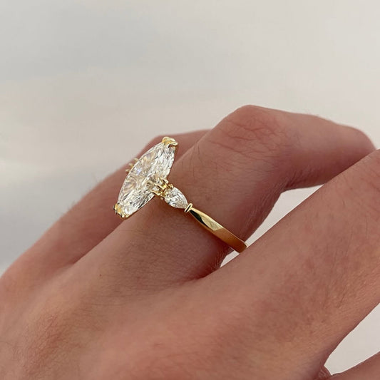 Oval Cut Claw Prong Solitaire Ring with Side Accents - view 3