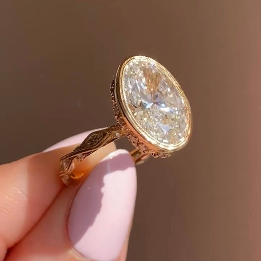 Vintage Vine Oval Cut Moissanite Bezel Set Engagement Ring - view 2