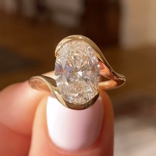 2.00 CT Sculptural Bezel Set Oval Cut Moissanite Diamond Ring with Fluid Design