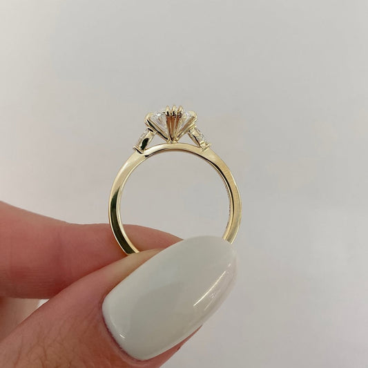 Oval Cut Claw Prong Solitaire Ring with Side Accents - view 4