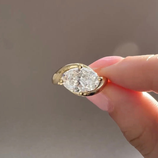 Oval Moissanite Solitaire Ring With Sculptural Bypass Band - view 3