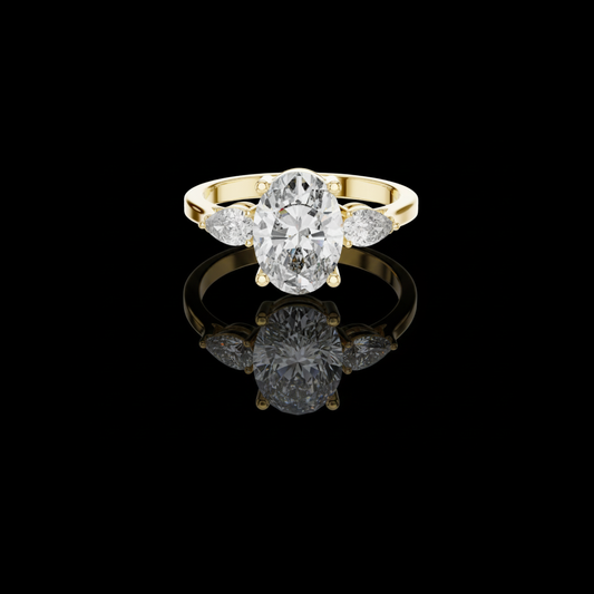 1.95 CT Classic Three Stone Moissanite Ring with an Oval Cut Center Diamond and Pear Shaped Side Diamonds