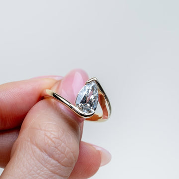 1.50 CT Aurora Flow Pear Cut Moissanite Diamond Ring with Sculptural Bypass Embrace For Your Girl