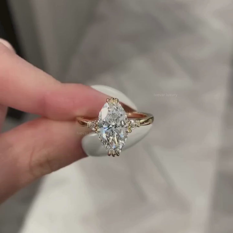 Oval Cut Claw Prong Solitaire Ring with Side Accents video